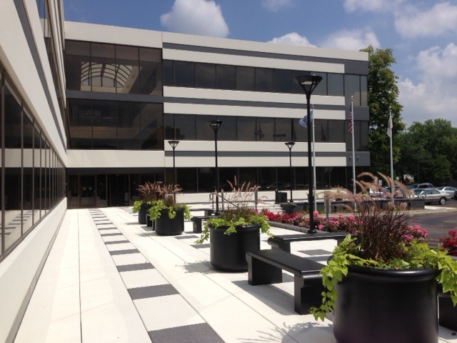 1300 W Higgins courtyard with benches and landscaping