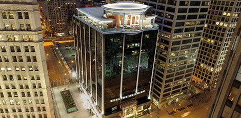 Aerial view of the National Association of Realtors building at nighttime