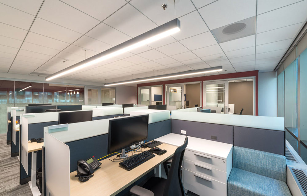 Office cubicle with desk and computer