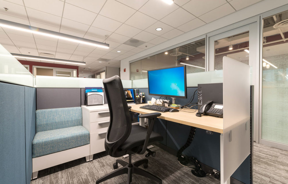 Office desk with computer and chair