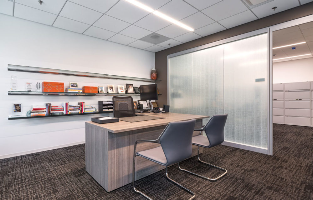 CAR office reception area with desk and two chairs