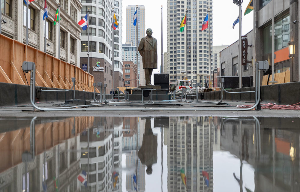 Large puddle in front of the Plaza of the Americas