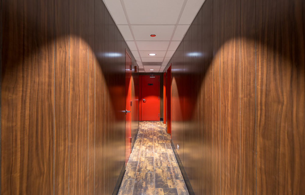 Newly renovated wood paneling hallway at The Billy Goat Tavern