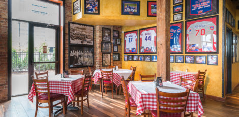 Pizano's restaurant with multiple tables and a variety of Chicago Cubs memorabilia on walls